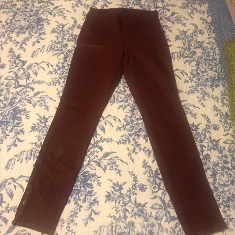 NYDJ Maroon “waxy feeling” pleather jeans with side ankle zippers. Super chic!
